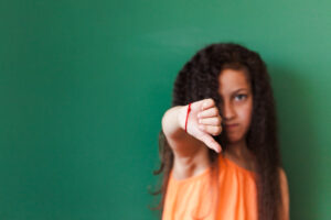 pupil-showing-thumb-down.jpg